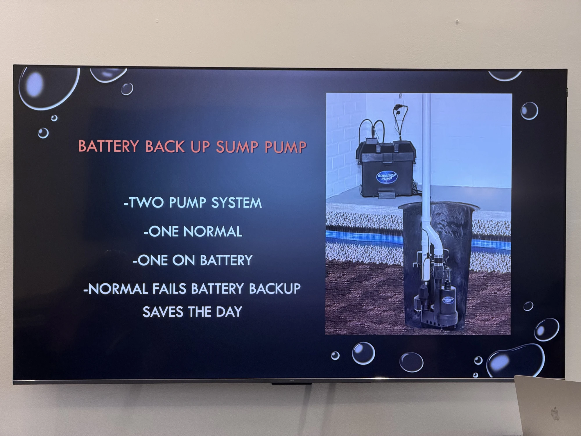 King Plumbing presentation slide explaining a battery backup sump pump system