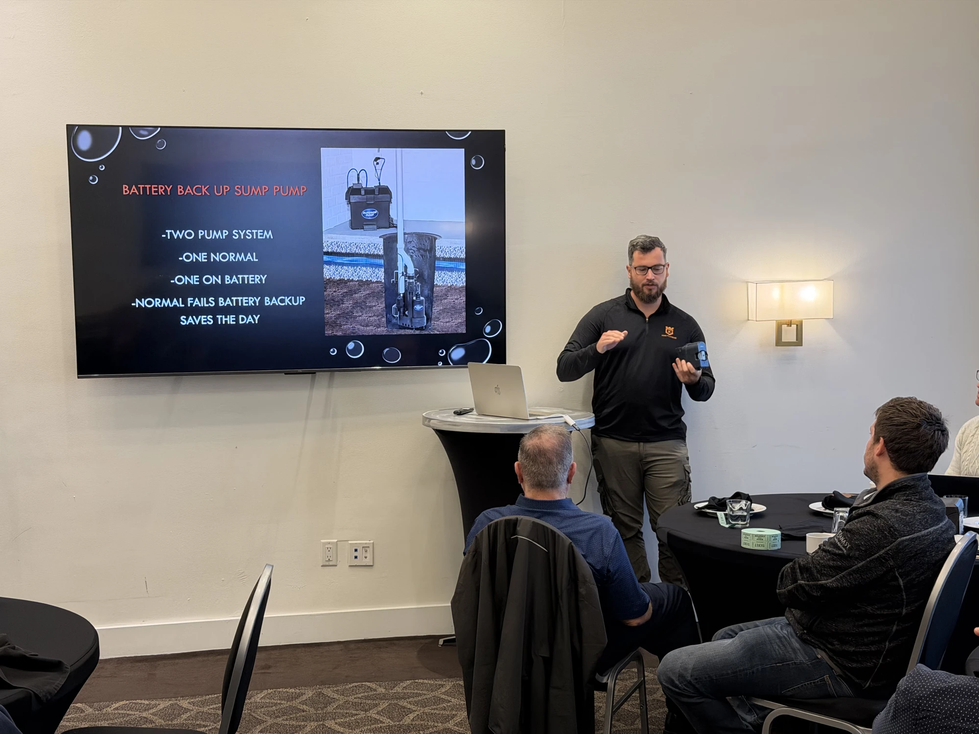 Brent Ringuette presenting battery backup sump pump protection to BEO members